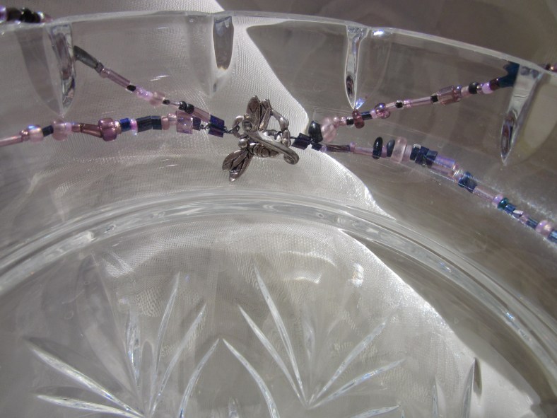 close up silver tone dragonfly clasp